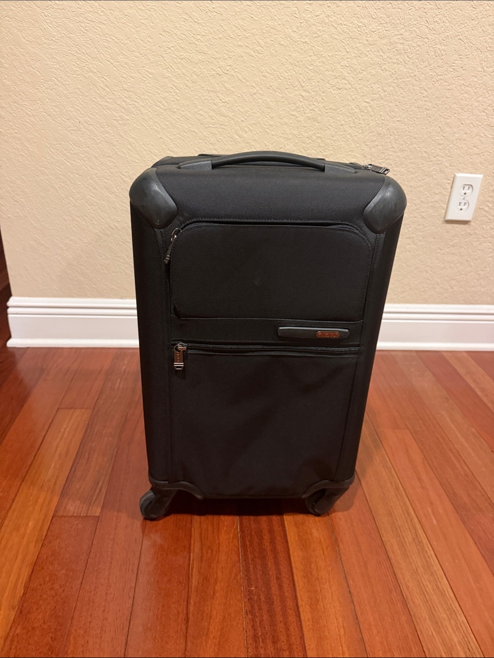 Tumi Black Upright Carry-On with Front Pocket